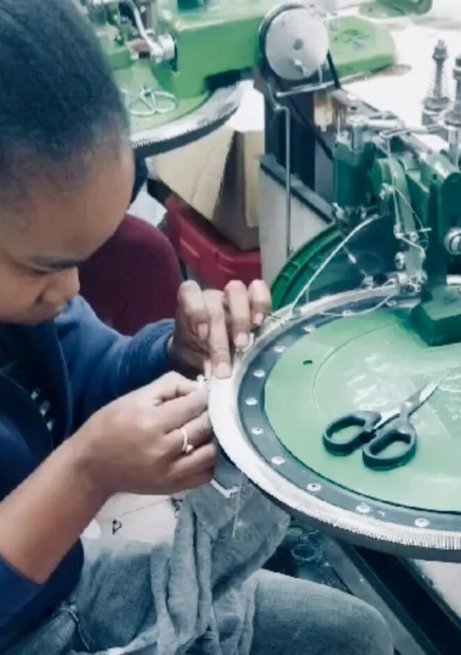 Artesian woman crafting clothing